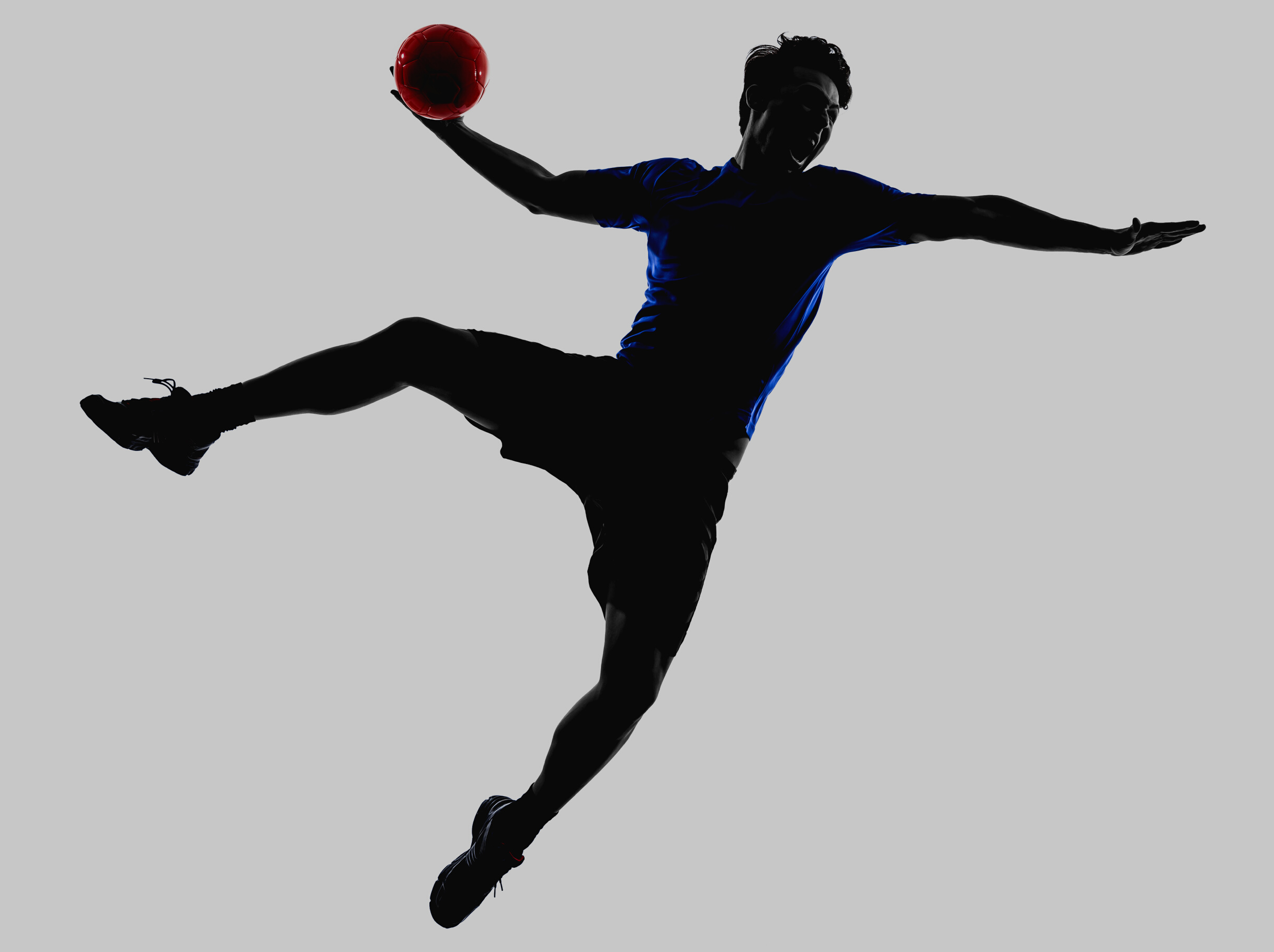 young man exercising handball player silhouette